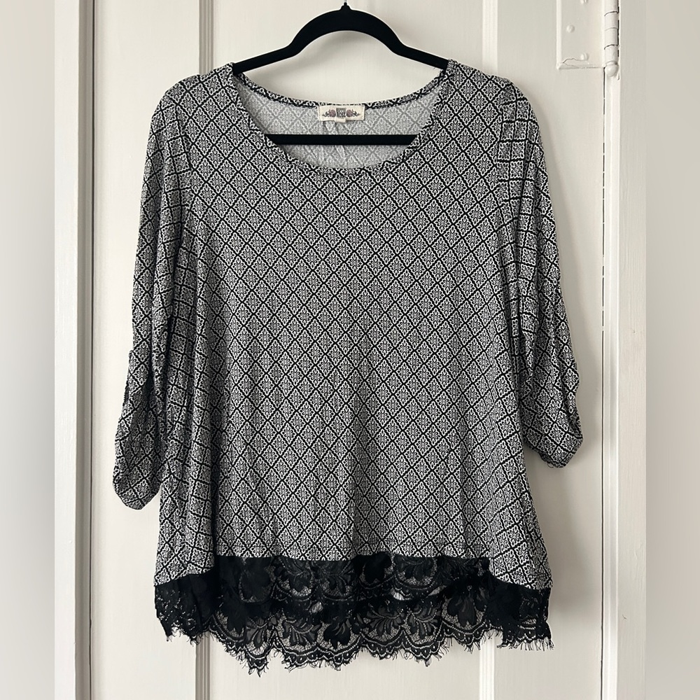 Black and White Blouse with Lace Trimming.